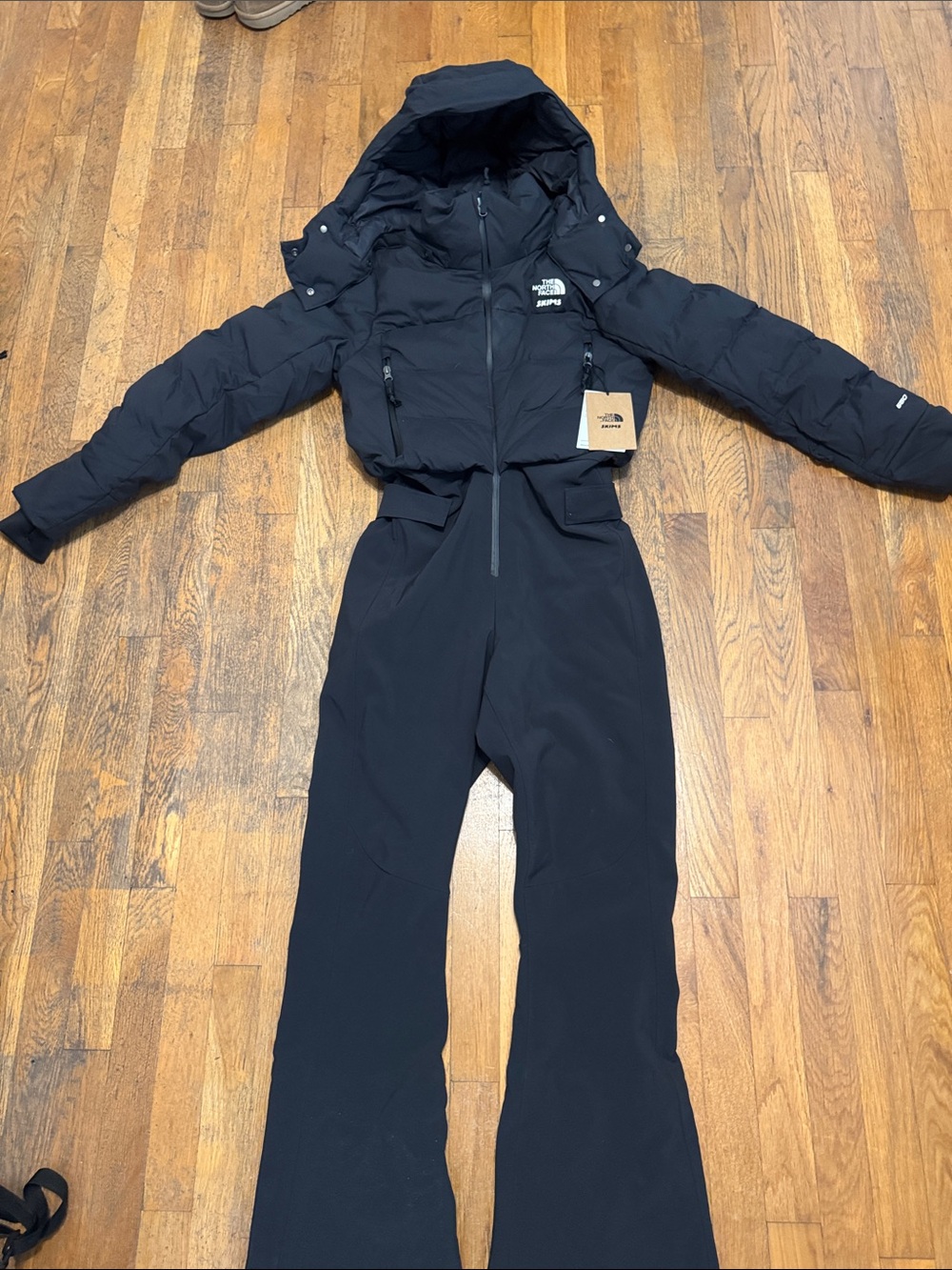 The North Face SKIMS Women's Black Insulated Puffer Ski Suit